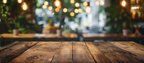 Aufkleber - Selected focus empty brown wooden table and Coffee shop or restuarant blur background with bokeh image. for your photomontage or product display. with copy space image