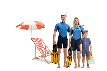 Poster - Full length portrait of a family in wetsuits, holding diving flippers and posing next to a beach chair