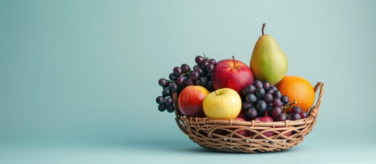 Wall Mural - Still life of fruit in basket isolated on pastel background. with copy space image. Place for adding text or design