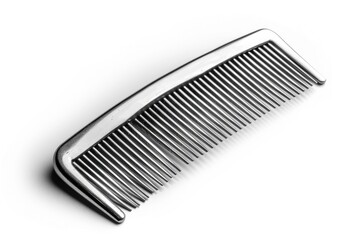 Poster - A close-up of a metal comb lying flat on a white background