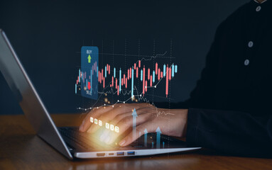 Businessman analyzing forex trading graph financial data. Business finance background.business finance technology and investment concept. Stock Market Investments Funds and Digital Assets.