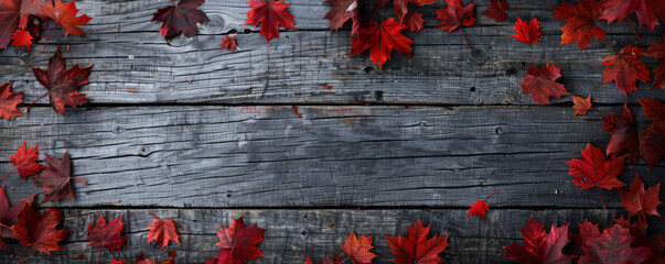 canada day background with a rustic wooden texture and scattered maple leaves.