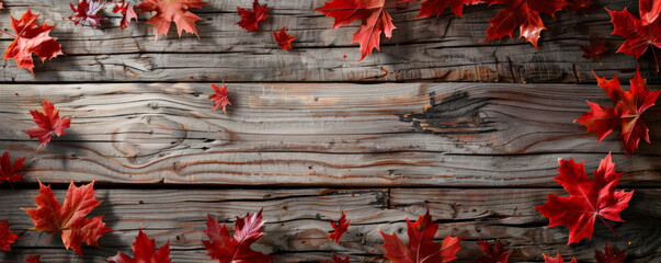 Wall Mural - Canada Day background with a rustic wooden texture and scattered maple leaves.