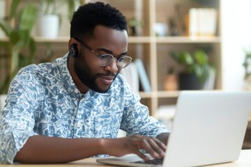 Wall Mural - african american young man hosts virtual open house for real estate property on laptop during online