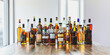© Mr. Stocker - A collection of various alcohol bottles displayed on a wooden table