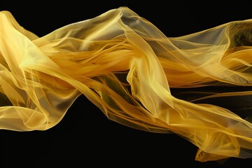 Poster - one peace of yellow tule fabric flying in the air on a complete black background, no shadows or lights 