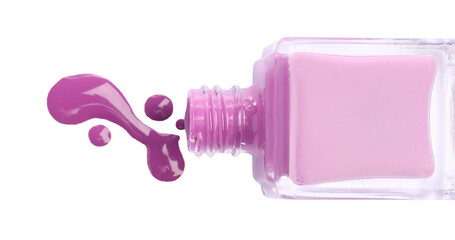 Bottle and spilled purple nail polish isolated on white, top view