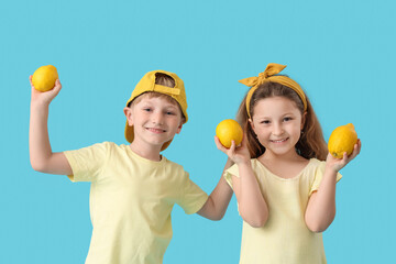 Poster - Cute children with lemons on blue background