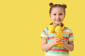 Sticker - Cute little girl with bottle of lemonade on yellow background