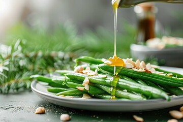 Drizzling almond sauce on green beans