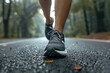 © Arpatsara - Runner's Legs on Wet Forest Path