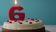 © Mason - birthday cake with a number 6 candle in a solid light blue color background