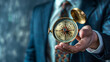 © nextzimost - Businessman Holding a Vintage Compass in Hand, Symbolizing Guidance and Direction in Professional Life