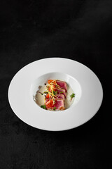 Sticker - Premium Seared Tuna Tataki Dish on Elegant White Plate with Dark Background