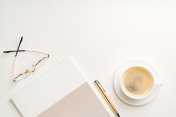 Wall Mural - Blank paper, coffee cup and glasses on white desk