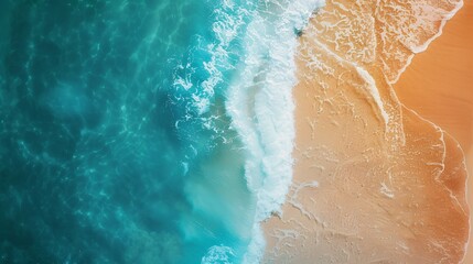 Aerial View of Turquoise Water Meeting Sandy Beach
