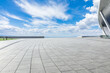 © ABCDstock - Empty square floor with sky clouds nature landscape. car background.