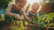 © paullawat - Girl and boy planting vegetable
