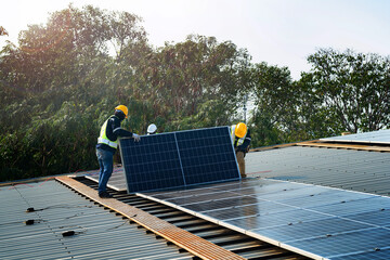 Wall Mural - worker technicians are working to construct solar panels system on roof. installing solar photovolta