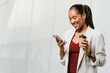 © Rawpixel.com - Happy woman in a blazer with a phone transparent png