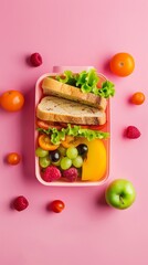 Healthy Plastic School Lunch Box with Sandwich, Fruits, and Vegetables. Children's Organic Diet Lunch Box or Snack Time Concept. Wide Banner with Copy Space. Seasonal Fruits, Vitamins, Green Healthy L