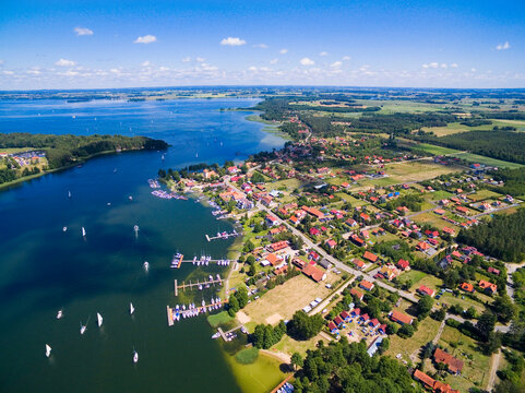 Aerial view of Rydzewo village on the shore of Boczne Lake, Masuria, Poland