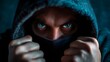 © doraclub - Hooded figure concealing identity suggesting potential charity fraud or scam