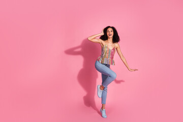 Wall Mural - Full length photo of lovely young lady dance have fun dressed stylish sequins garment isolated on pink color background