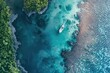© Thamonchanok - Aerial view of a boat sailing in clear turquoise waters near lush green islands and coral reefs, perfect for drone photography and travel imagery.