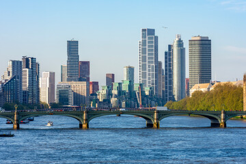 Wall Mural - Vauxhall district in south London and Westminster bridge over Thames river, UK