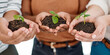 © MollerFinest/peopleimages.com - Soil, leaves and hands of business people with teamwork, collaboration and support for earth day. Eco friendly, community and group of employees with dirt for green plants growth for sustainability.