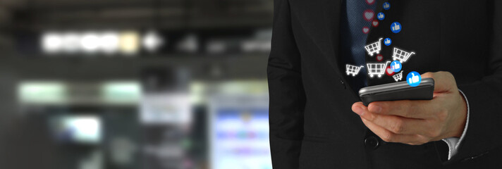 Man holding smartphone device and touching screen