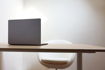 Wall Mural - Stylish modern laptop on wooden table indoors. Space for text