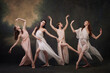 © Lustre Art Group  - Classical Beauty. Dance ensemble in flowing robes captures essence of classical ballet against vintage studio background. Concept of ballet, history, fusion of modernity and ancient times in art.