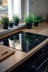Poster - A modern kitchen with a stove and a window, perfect for cooking or looking out at the scenery