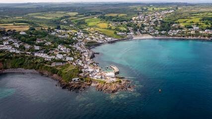 Wall Mural - Aerial view of the Cornish fishing village of Coverack and its sandy beach