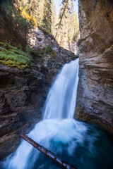 Wall Mural - Johnston Canyon Lower Falls beautiful natural scenery. Banff National Park, Alberta, Canada. Canadian Rockies.