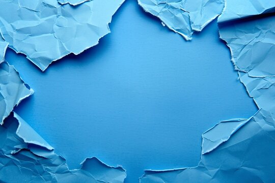 a blue paper with torn edges