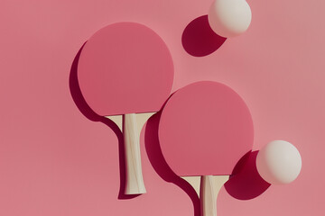 two ping pong paddles, two balls, and a pink surface. perfect for showcasing table tennis or recreat