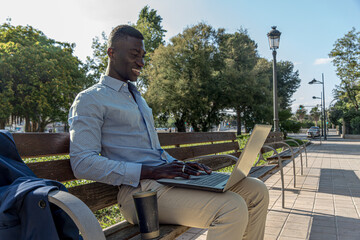 African American executive in virtual meeting in sunny financial distric