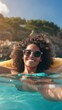 © AnaV - Woman in sunglasses floating in water. Vertical banner with copy space
