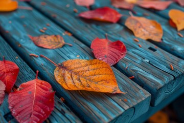 Wall Mural - Autumn Leaves on Wooden Surface