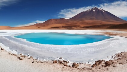 Wall Mural - blue lagoon in atacama desert in the middle of a white salt flat with ripples in chilean altiplano