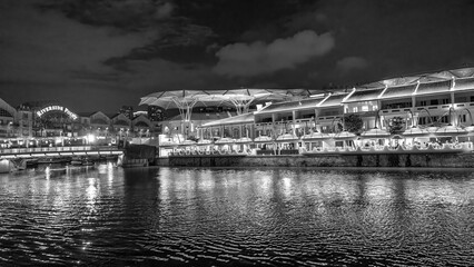 Poster - Singapore - September 13, 2023: Clarke Quay along the city river at night