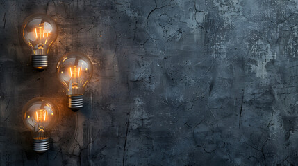Wall Mural - glowing light bulbs on black background - copy space