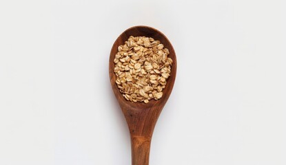 Wall Mural - Natural Oats in Wooden Spoon for Breakfast or Snack