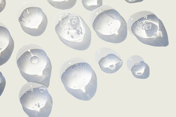 Poster - Cosmetic lotion or transparent gel drops texture background