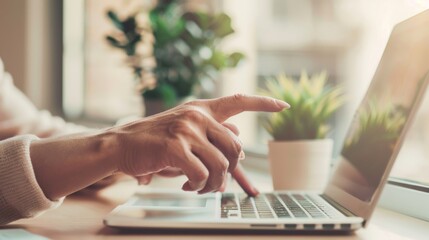 A woman is pointing at a laptop screen. Generate AI image