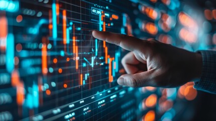 Strategic Insights: Businessman's Hand Pointing at Financial Graph on Digital Screen