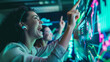 © EpicVisuals - Tech Professionals Analyzing Data and Celebrating Market Growth Teamwork Success Digital Technology Business Strategy
